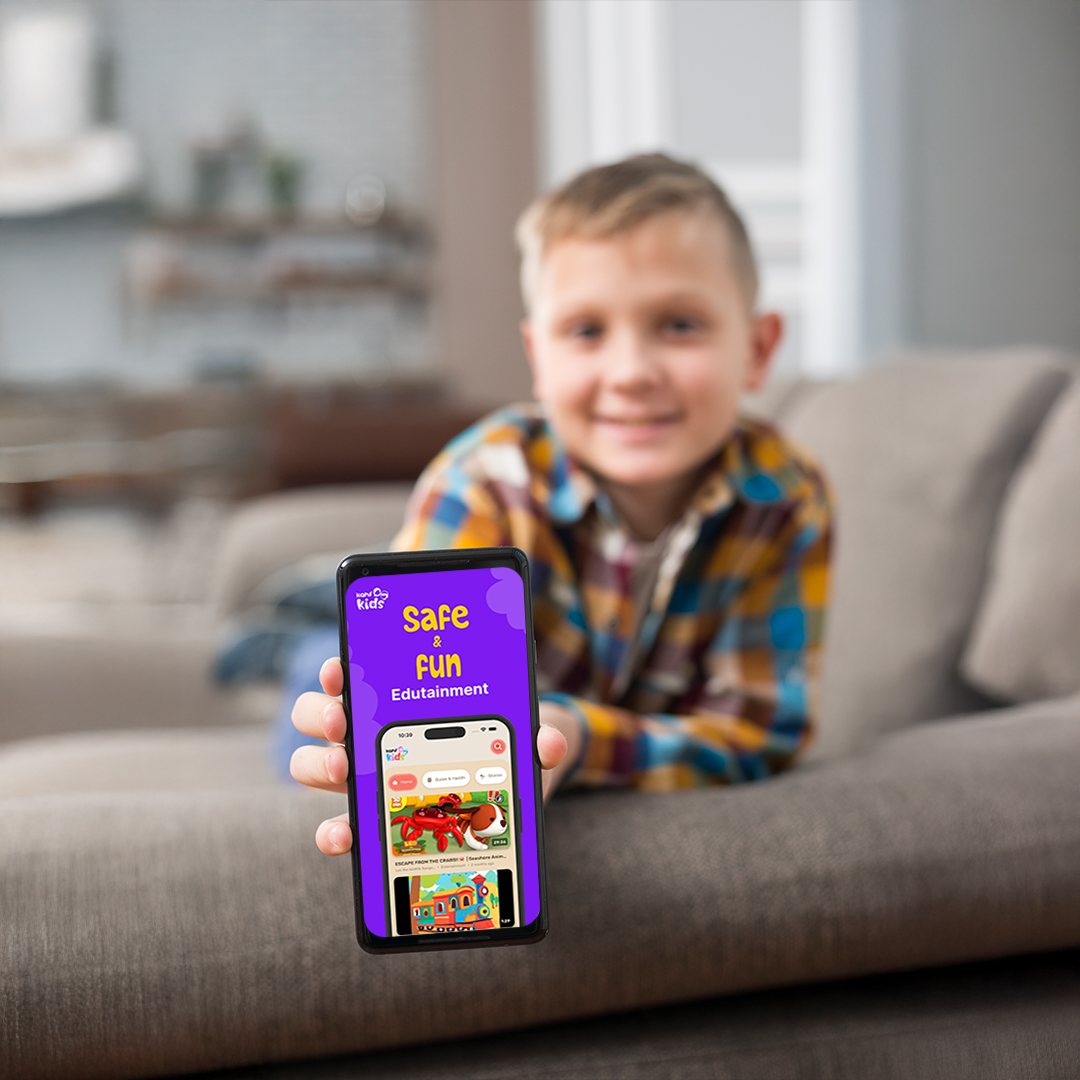 Child using Kahf Kids app on phone for safe and fun Islamic edutainment — a halal digital alternative to YouTube and screen addiction.